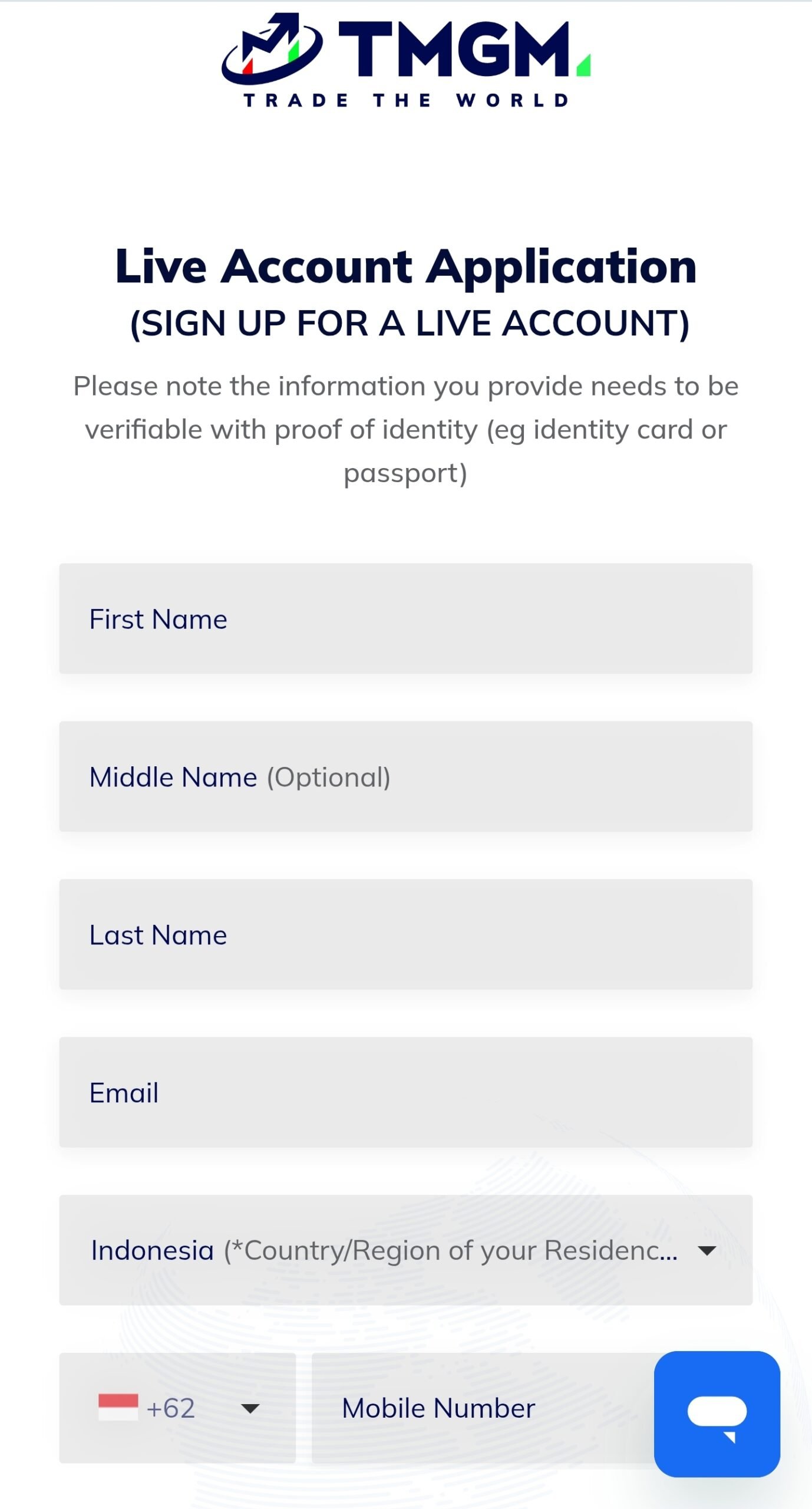 Formulir pendaftaran akun real TMGM lewat HP dengan kolom nama, email, negara tempat tinggal, dan nomor telepon.